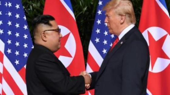 ترامب وكيم يتعهدان بنزع السلاح النووي وبأمن كوريا الشمالية